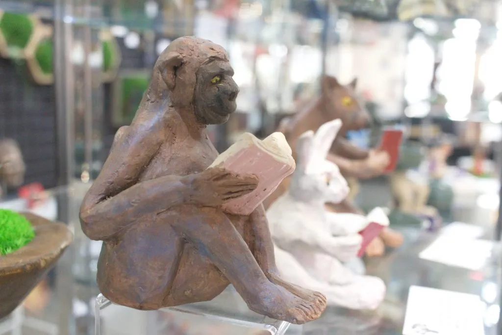 A photo of the sculpture "Reading Monkey" by Keith Turnbull