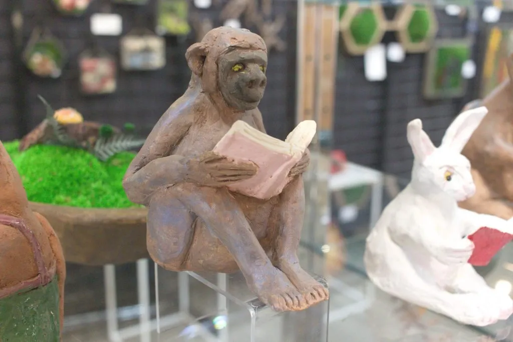 A photo of the sculpture "Reading Monkey" by Keith Turnbull