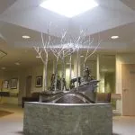A photo of the sculpture "In the Birches" by Tania Garner-Tomas